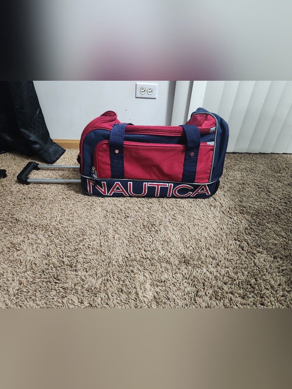 Nautica Red and Navy Rolling Travel Duffle.  Only Used Once